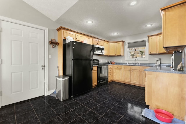 kitchen featuring light brown cabinetry, sink, a textured ceiling, and black appliances