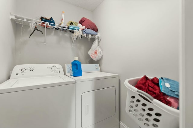 washroom featuring separate washer and dryer