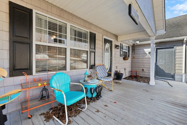 wooden terrace featuring a porch