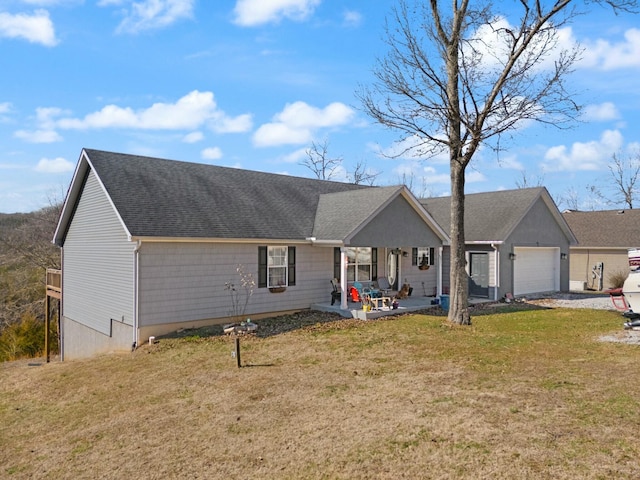 single story home with a garage, a patio area, and a front lawn