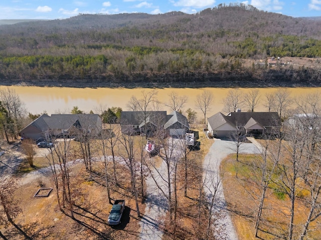 aerial view featuring a water and mountain view