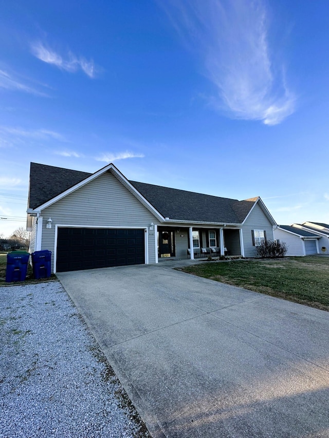 ranch-style home featuring a garage and a porch