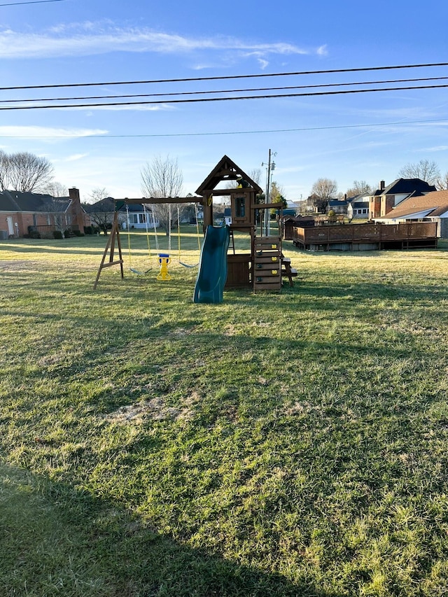 view of play area with a yard