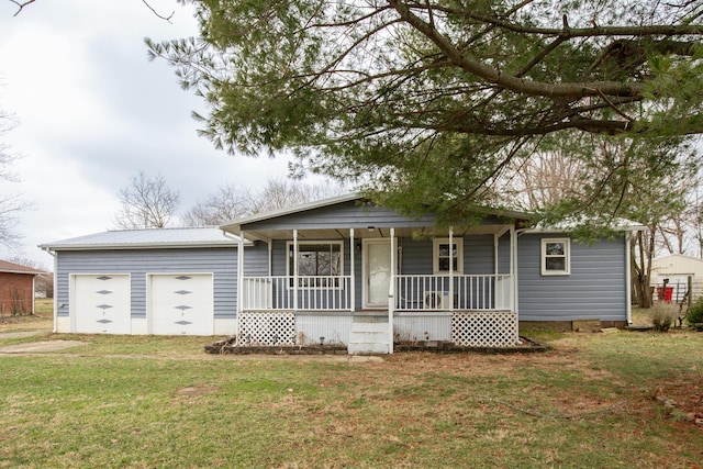 single story home featuring a garage, a front yard, and a porch