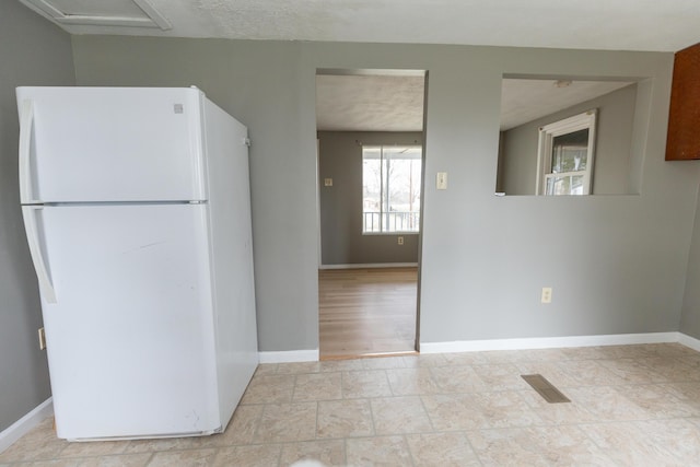 kitchen with white refrigerator