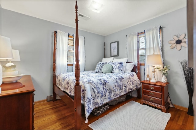 bedroom featuring wood-type flooring