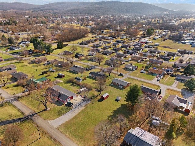 drone / aerial view featuring a mountain view