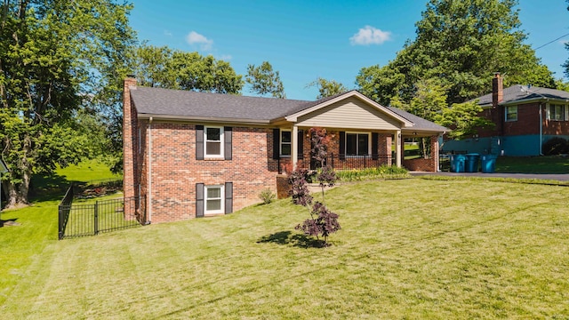 665 Linda Ave, Danville, KY 40422 - view of front facade with brick siding, a chimney, and a porch