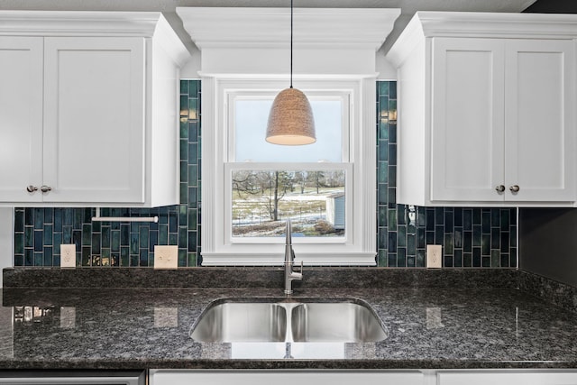 665 Linda Ave, Danville, KY 40422 - kitchen with a sink, white cabinetry, and backsplash