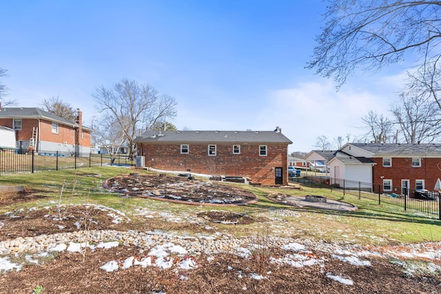 rear view of house featuring a chimney, a residential view, fence, and brick siding