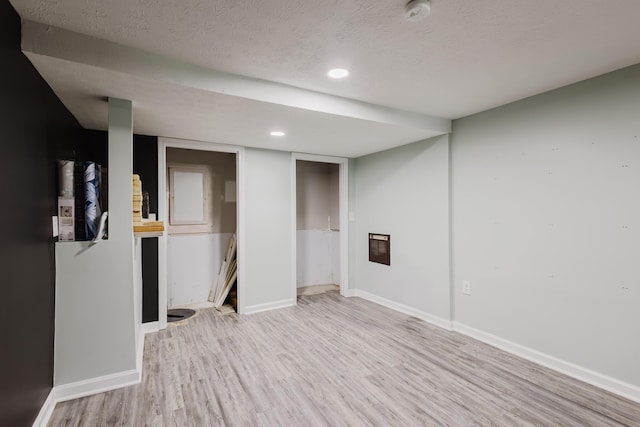 665 Linda Ave, Danville, KY 40422 - finished below grade area with light wood-style flooring, a textured ceiling, baseboards, and recessed lighting