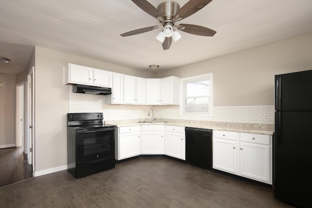 kitchen with black appliances, white cabinetry, and under cabinet range hood