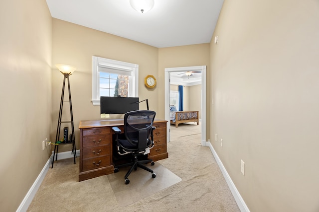 office area with baseboards and light colored carpet