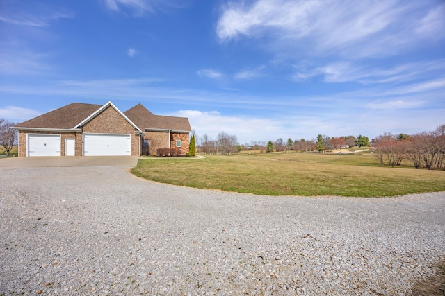 view of front of home with brick siding, a shingled roof, concrete driveway, a front yard, and an attached garage