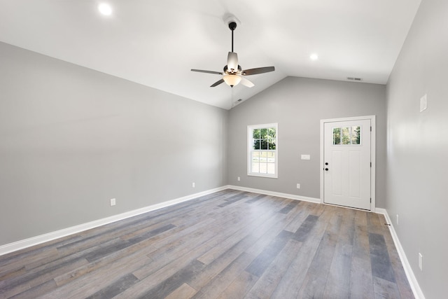 interior space with wood-type flooring, ceiling fan, and vaulted ceiling