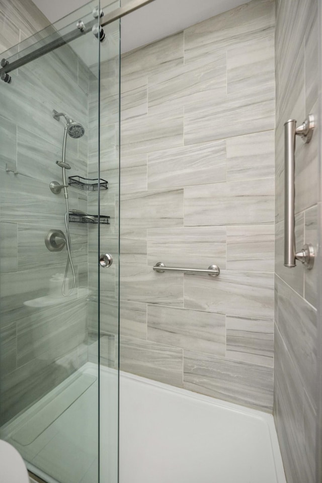 bathroom featuring a stall shower