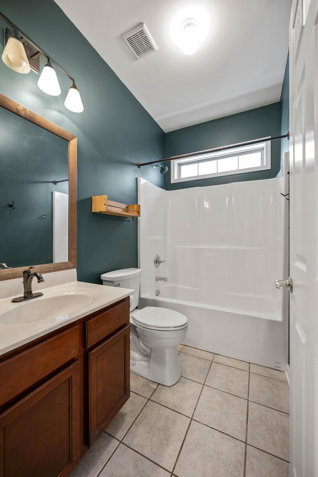 full bathroom featuring shower / bathtub combination, visible vents, toilet, vanity, and tile patterned flooring