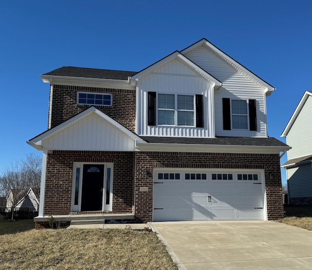 view of front facade with a garage and a front yard