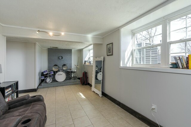 living room with light tile patterned flooring and a textured ceiling