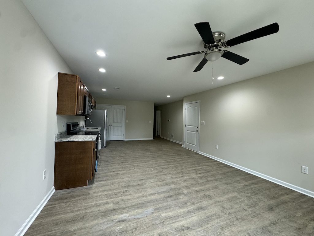 313 Baughman Ave Unit 8, Danville, KY 40422 - unfurnished living room with recessed lighting, wood finished floors, a ceiling fan, and baseboards