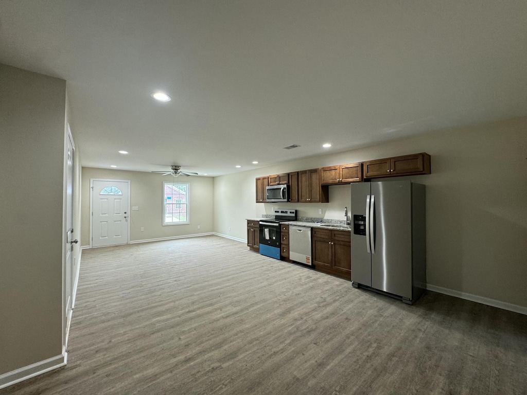 313 Baughman Ave Unit 8, Danville, KY 40422 - kitchen featuring appliances with stainless steel finishes, baseboards, wood finished floors, a ceiling fan, and recessed lighting