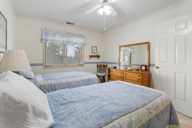 bedroom featuring ceiling fan and ornamental molding