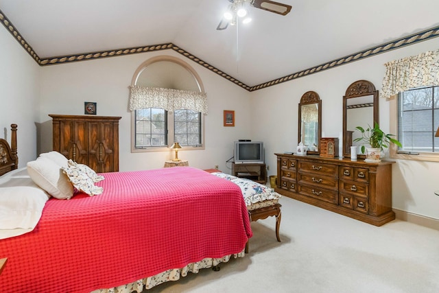 bedroom with carpet, lofted ceiling, and ceiling fan