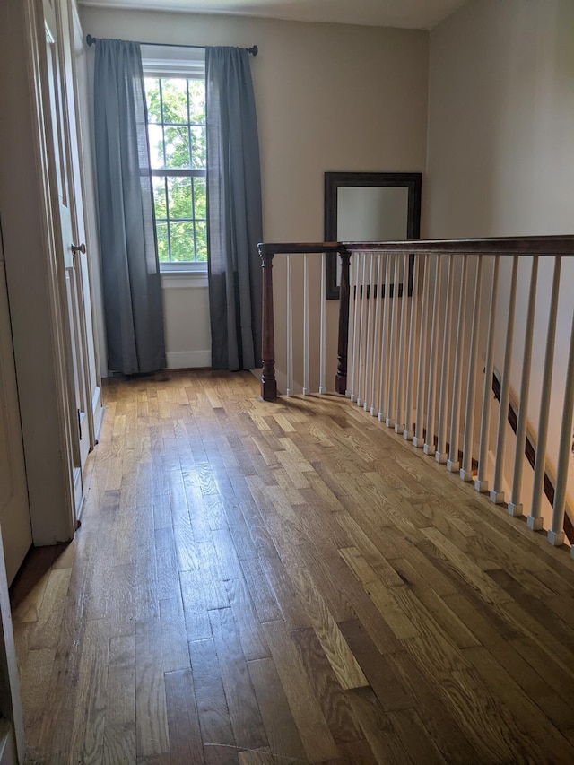 unfurnished room with light hardwood / wood-style floors