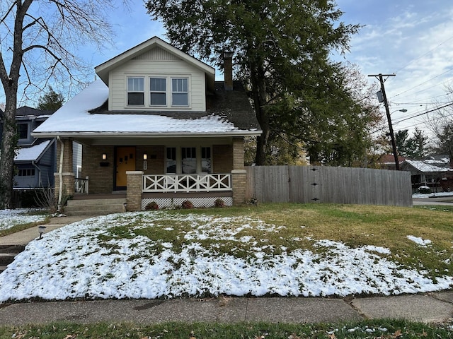 view of front of property featuring covered porch