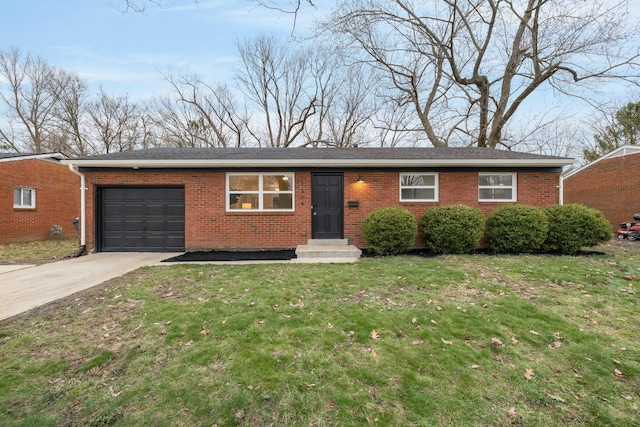 single story home featuring entry steps, brick siding, driveway, and a front lawn