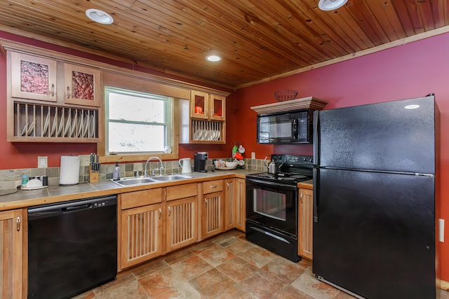 kitchen featuring sink, tile countertops, black appliances, and wooden ceiling