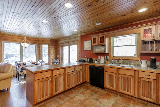 kitchen featuring sink, wooden ceiling, black dishwasher, kitchen peninsula, and pendant lighting