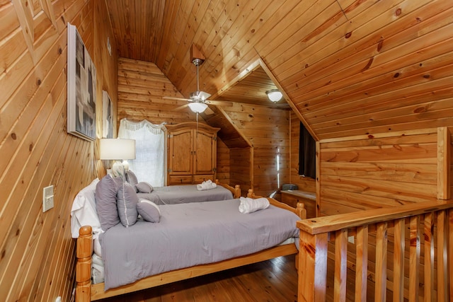 bedroom with wood ceiling, lofted ceiling, wooden walls, and hardwood / wood-style floors