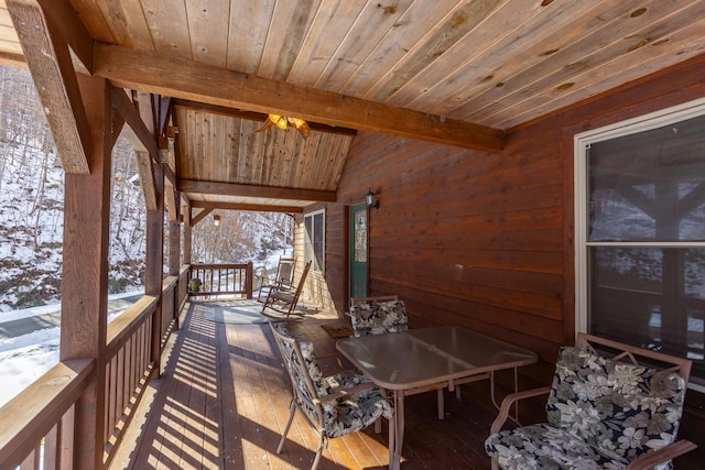 view of snow covered deck