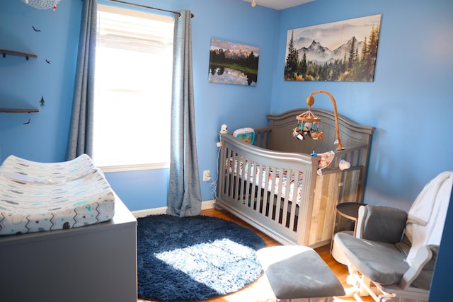 bedroom featuring hardwood / wood-style flooring