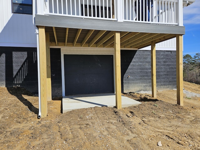 view of patio / terrace with an attached garage