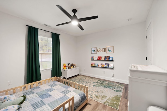 349 Sycamore Dr, Bronston, KY 42518 - bedroom featuring light wood-type flooring and ceiling fan