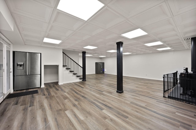 349 Sycamore Dr, Bronston, KY 42518 - basement featuring wood-type flooring and stainless steel fridge with ice dispenser