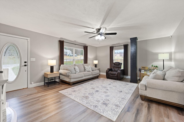 349 Sycamore Dr, Bronston, KY 42518 - living room with a textured ceiling, hardwood / wood-style flooring, and ceiling fan