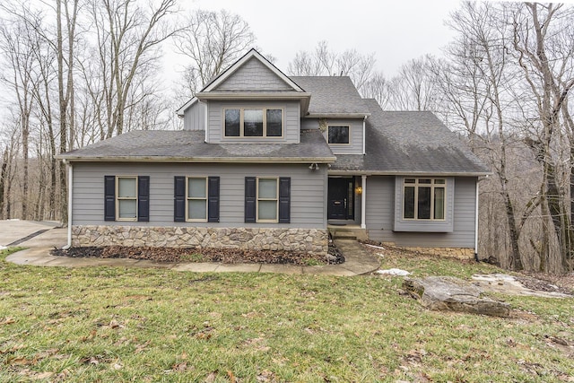 view of front of property with a front lawn