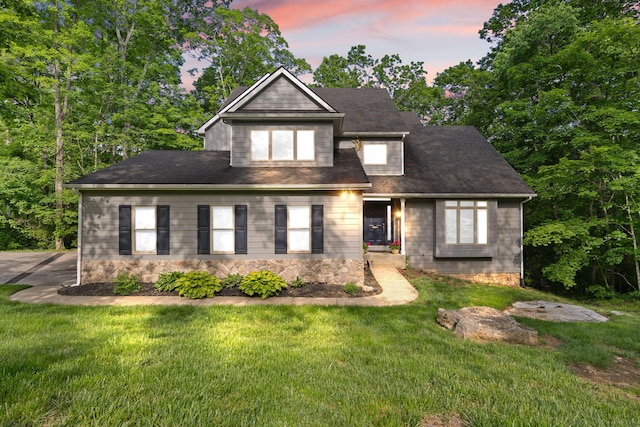view of front of house with a lawn