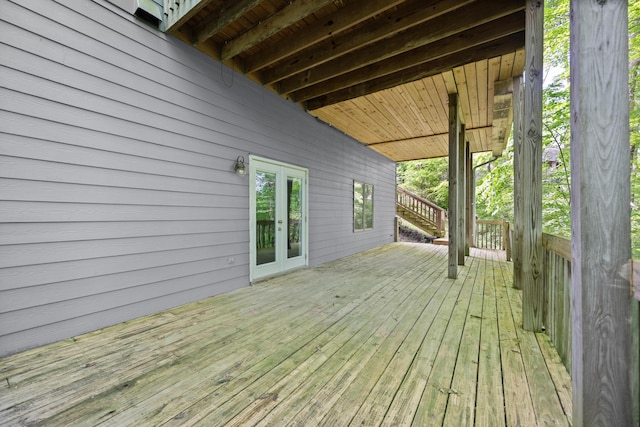 wooden deck featuring french doors