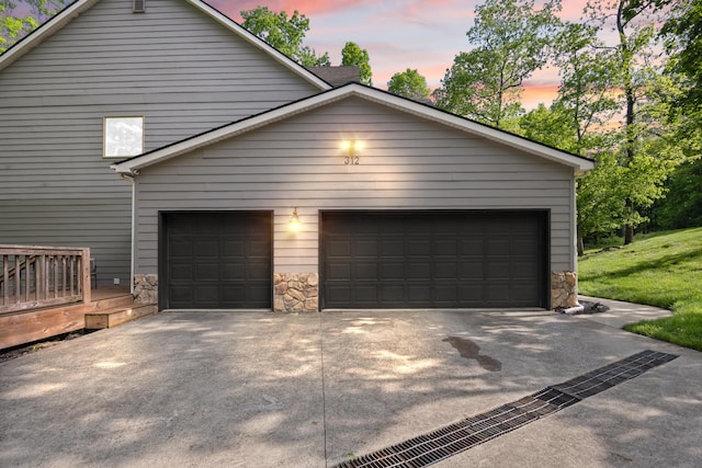 garage with driveway