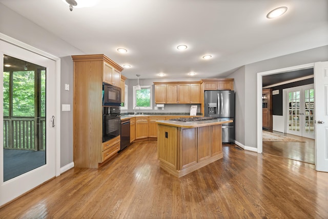 312 Avawam Dr, Richmond, KY 40475 - kitchen featuring black appliances, dark wood finished floors, a center island, baseboards, and recessed lighting