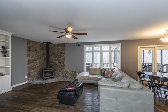 312 Avawam Dr, Richmond, KY 40475 - living area with a ceiling fan, a wood stove, and wood finished floors