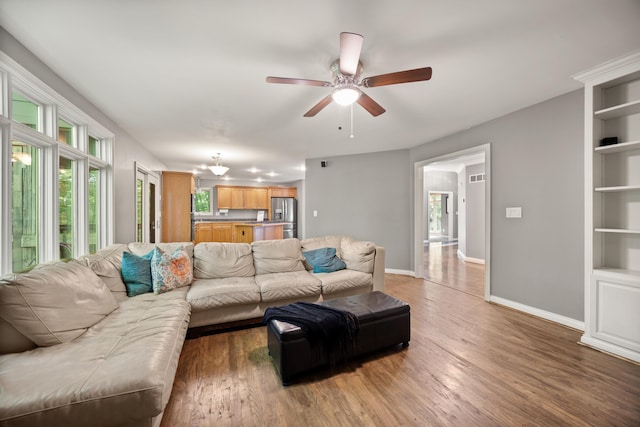 312 Avawam Dr, Richmond, KY 40475 - living area featuring baseboards, ceiling fan, and light wood-style floors