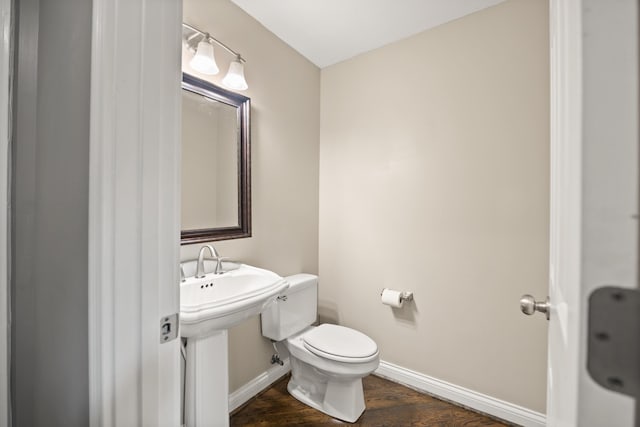 312 Avawam Dr, Richmond, KY 40475 - half bathroom featuring baseboards, toilet, and wood finished floors
