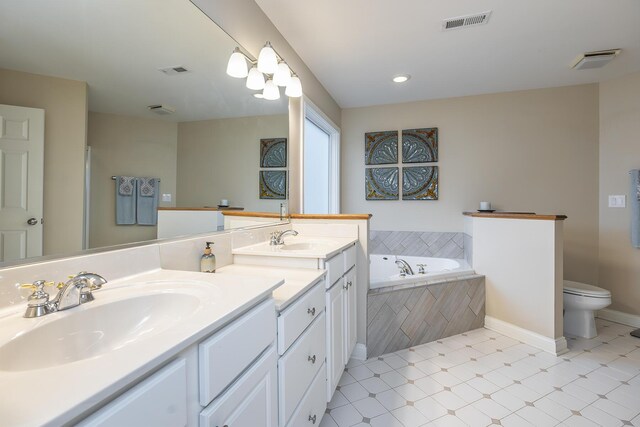 312 Avawam Dr, Richmond, KY 40475 - full bathroom with double vanity, a garden tub, toilet, and tile patterned floors