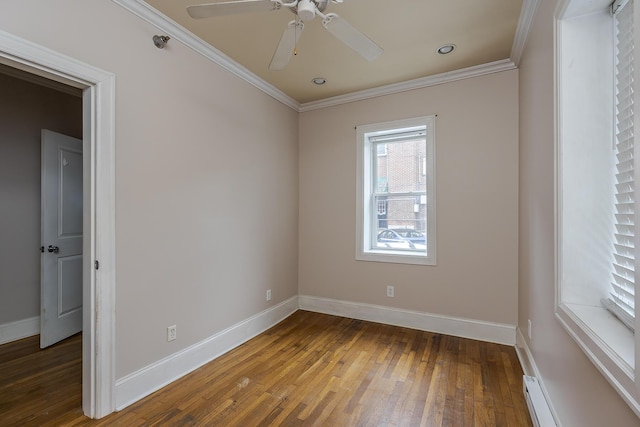 unfurnished room with a baseboard heating unit, crown molding, ceiling fan, and hardwood / wood-style flooring