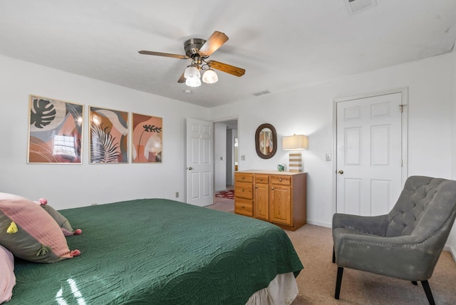 carpeted bedroom with ceiling fan